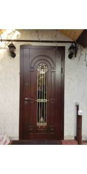 НАШІ РОБОТИ Вхідні двері металеві в будинок. З двох сторін  накладки із тонованої вологостійкої фанери